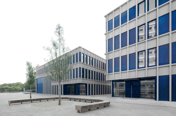 Blue tiled facades on two new university buildings reference Gießen’s 1960s architecture